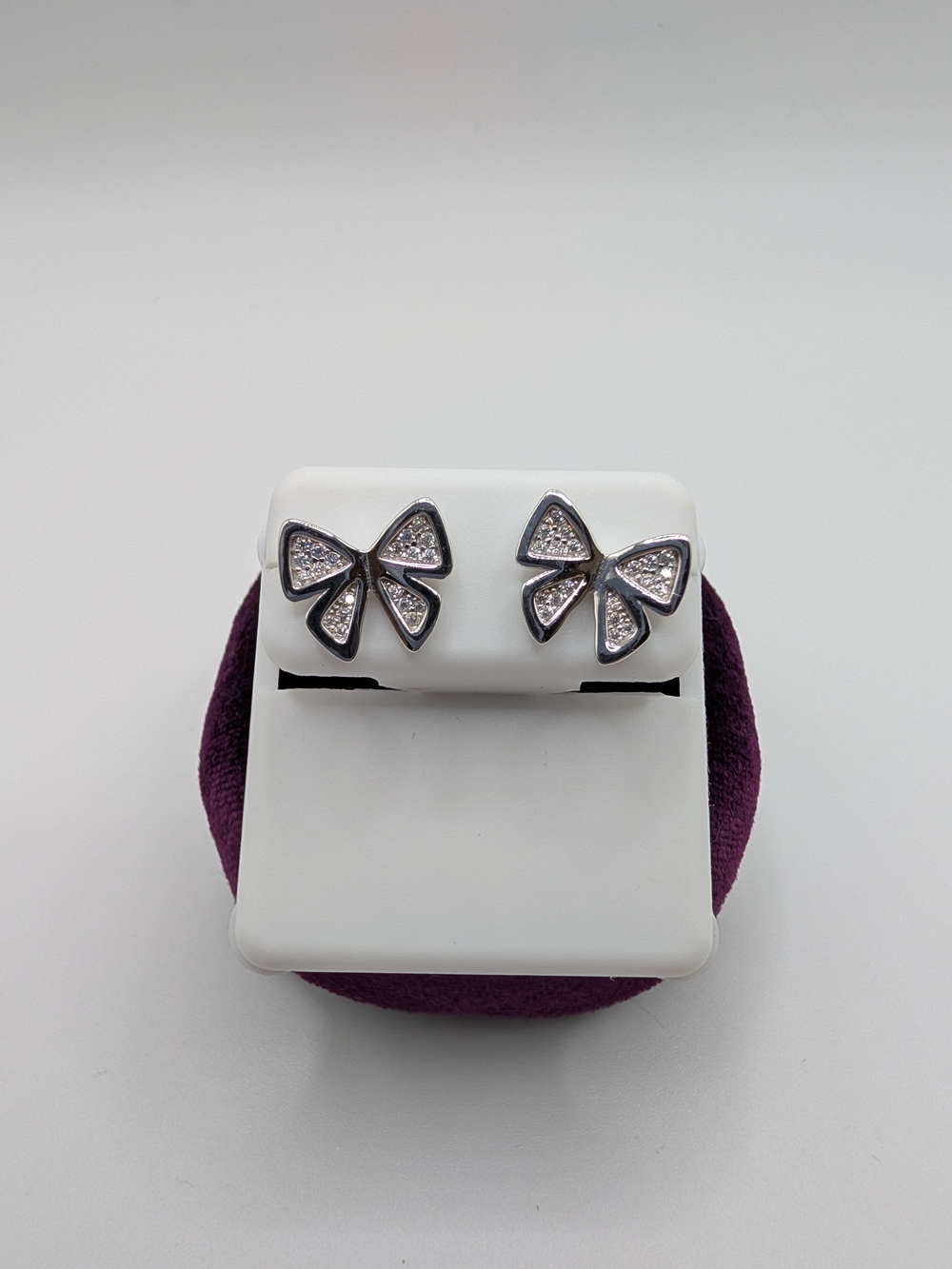 Silver Bow Stud Earrings with Crystal Accents - White